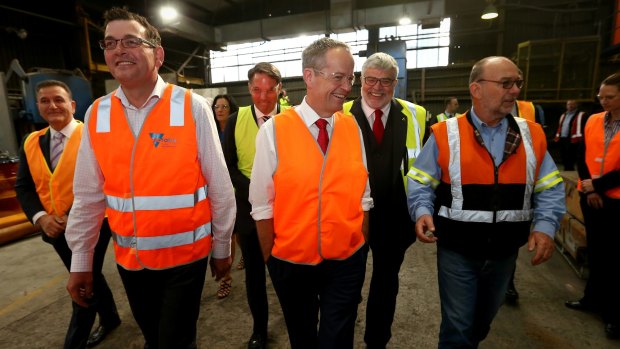 Hi vis, high stakes: Daniel Andrews joins Bill Shorten in Geelong, where voters are looking for leadership on the key issue of jobs.
