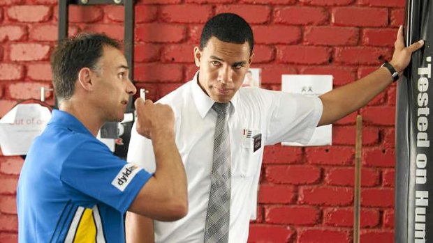 Secret weapon: Devout Mormon William Hopoate chats with Parramatta Eels strength and conditioning coach Ciriaco "Cherry" Mescia at the gym the club set up for him in Beenleigh.