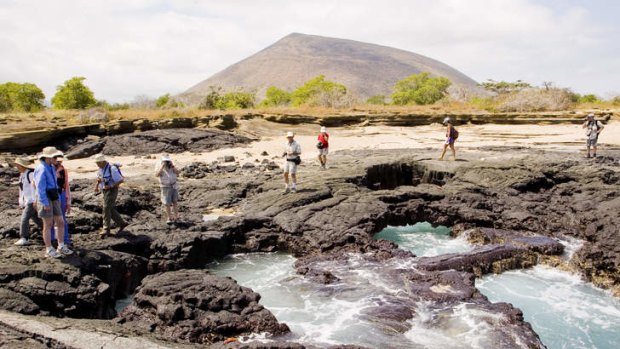 Traversing the volcanic landscape Santiago Island.