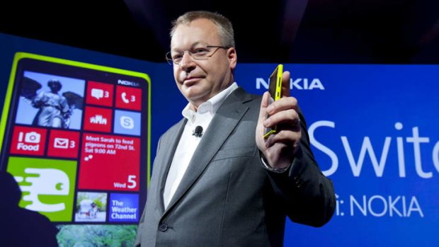 Nokia chief executive Stephen Elop with the Windows-based Nokia Lumia which has helped revive the company.