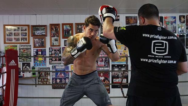 Punch up ... Sonny Bill Williams training before Friday's fight against South Africa's Francois Botha.
