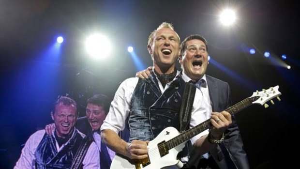 Ticket to the world ... Gary Kemp and Tony Hadley, right, belt out a back catalogue of  tosh you find   very hard not to sing along with.
