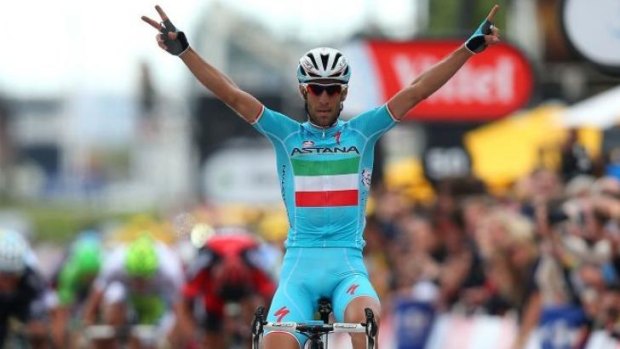 Astana's Vincenzo Nibali crosses the line in Sheffield to win the second stage of the 2014 Tour de France.