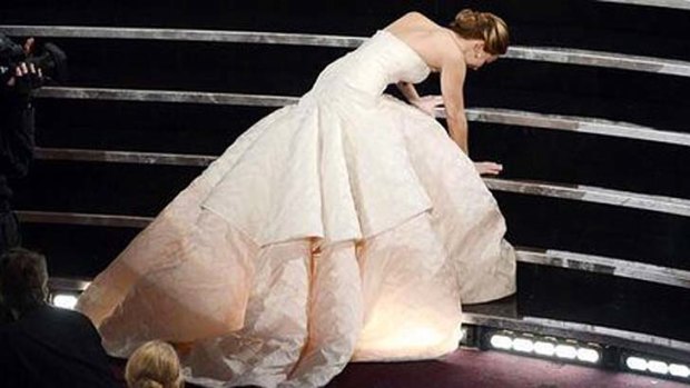 Stair stack ... Jennifer Lawrence takes a fall while on her way to collecting the Oscar for Best Actress.