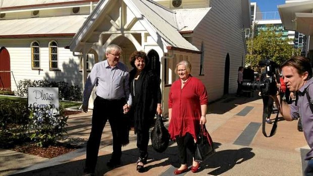 Prime Minister Kevin Rudd and wife Therese Rein leave a Brisbane church where they attended a service.