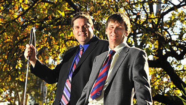 Tony Clark, left, and Steven Hurd face more than political problems but remain confident in their political campaigns.