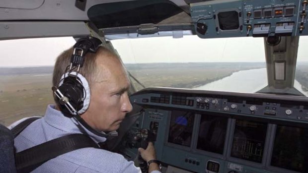 Vladimir Putin . . . firefighting antics criticised.