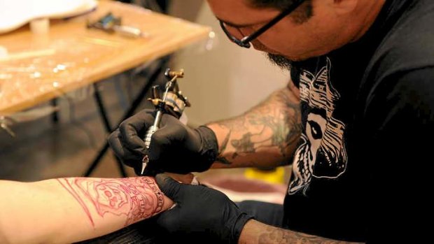 It seemed like a good idea: Tattoos inked in youth are often removed in later years.