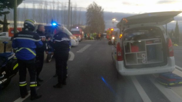 A school bus and a regional train collided in southern France on Thursday, killing four children and critically injuring several other people on the bus.