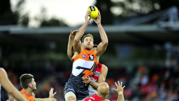 SPORT: GWS giants v Sydney Swans at Manuka oval, Canberra. GWS player Shane Mumford in action.    20th February 2014. Photo by Melissa Adams of the Canberra Times