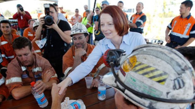 Coal comfort ... Julia Gillard meet miners in Queensland.