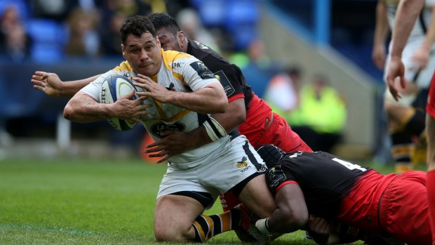 Overseas sojourn: Wasps' George Smith is tackled during the European Rugby Champions Cup semi-final against Saracens in April.