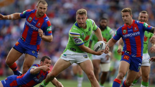 Handy pick-up: Raiders recruit Elliott Whitehead takes on the Newcastle defence on Saturday.