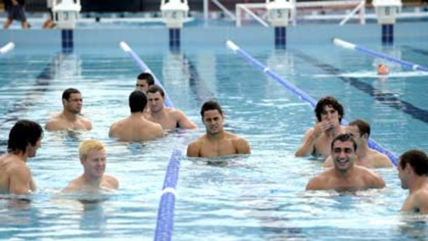 Like Eels to water ... Parramatta players take to the pool for their recovery session yesterday. Star centre Timana Tahu blamed the team’s habitual slow starts to matches for the loss to Wests Tigers the previous night.