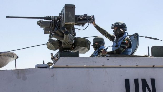 Irish members of the United Nations Disengagement Observer Force in armoured vehicles in the Israeli-annexed Golan Heights.