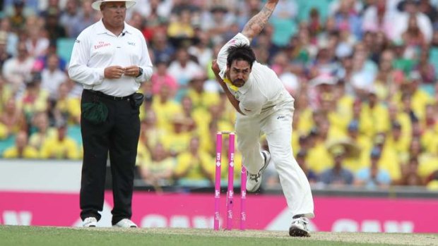 Short and sharp: Mitchell Johnson  late in the day.