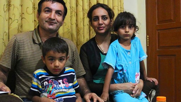 Still waiting: Binai Abdu Samad, his wife Samira Ghanavati, and their children, in Indonesia.