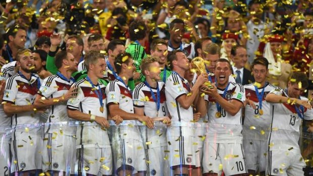 Long overdue: Germany finally gave their fans the World Cup trophy that had eluded them for 24 years.
