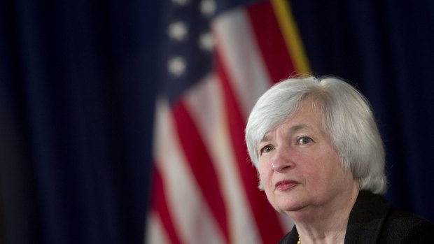 The Fed said "economic activity has been expanding at a solid pace," a move away from its "moderate pace" reference in its prior statement.