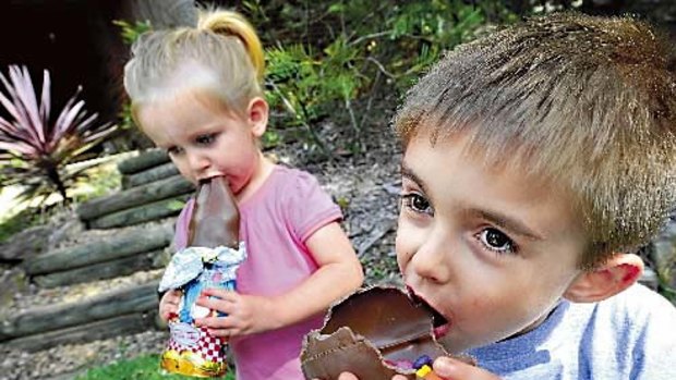 The ultimate test... Lucy Brown, 2, and big brother Noah, 4, tuck into some easter eggs at their Blue Mountains home.