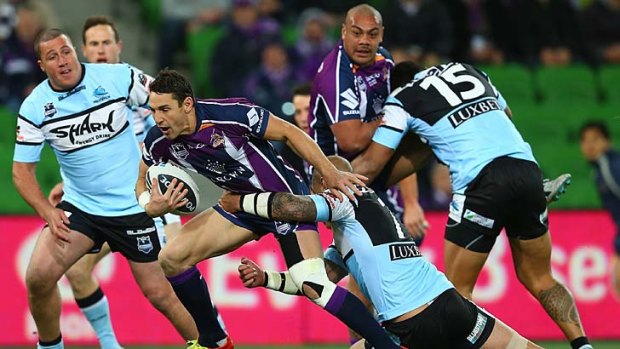 The great escape ... Billy Slater and the Storm kept their minor premiership hopes alive with a last-minute win over the Sharks.