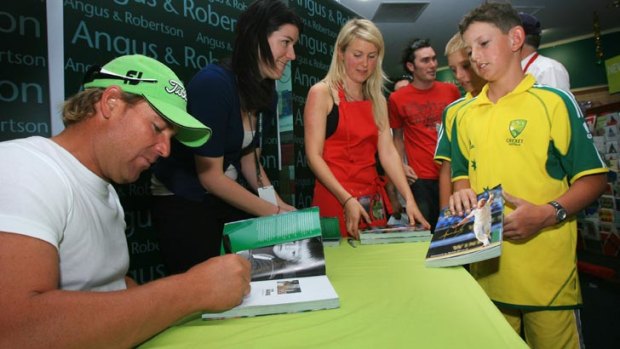 'Ethiopian' : Shane Warne signs books for fans in 2006.