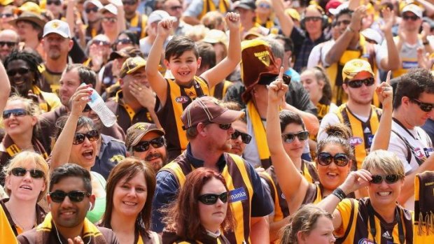 Hawthorn supporters at Glenferrie Oval on Sunday to celebrate the team's premiership win.