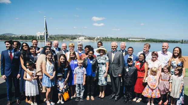 Twenty-eight people from 13 countries were conferred with Australian citizenship in Canberra on Thursday, Prime Minister Malcolm Turnbull leading them in their oath.