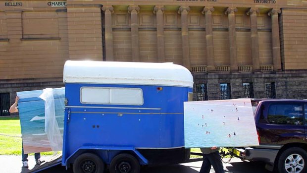 Last-minute ... artworks by Paul Haggith are unloaded at the Art Gallery of NSW.