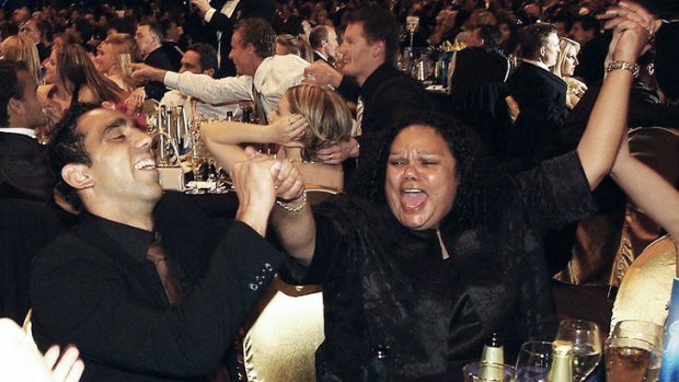 Driving force ... Adam Goodes celebrates his win with his mother , Lisa May, after winning the 2003 Brownlow Medal.
