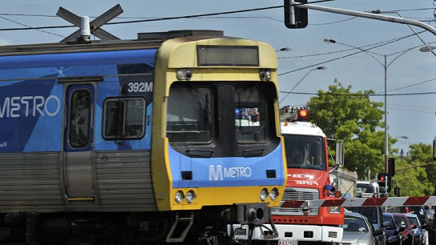 Death trap?  ... A fire truck waits at the notorious Clayton railway crossing.