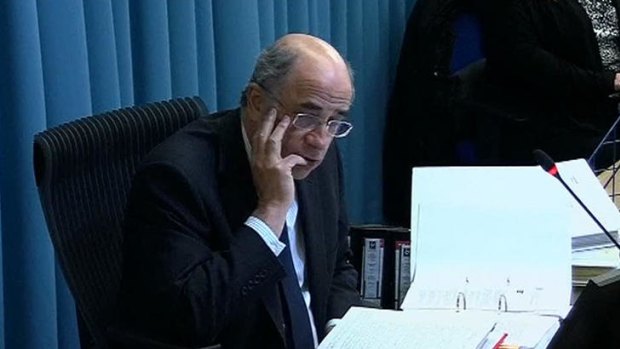 Leading the inquiry ... Lord Justice Brian Leveson listens to a response from former News International chairman James Murdoch in London.