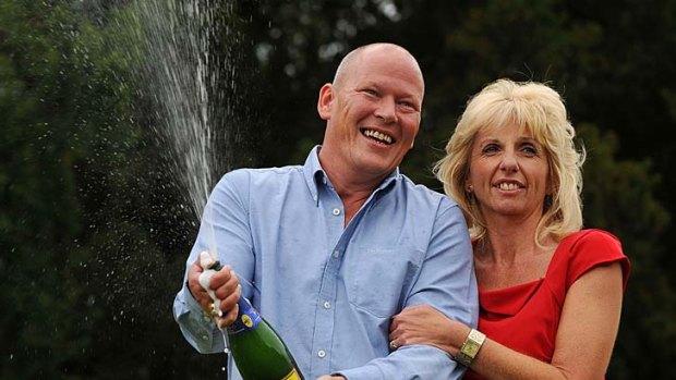 Lottery delight ... Dave and Angela Dawes celebrate.