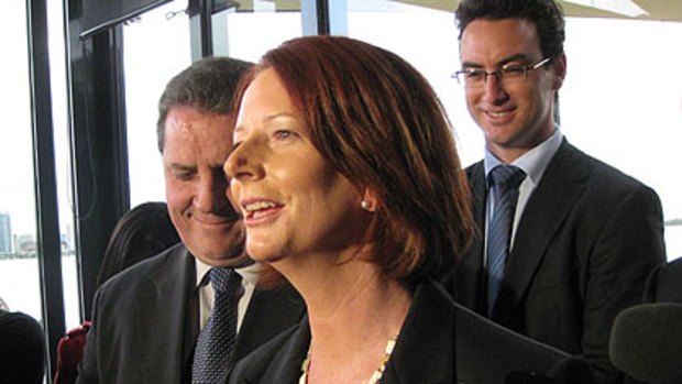 Julia Gillard laughs off an earlier egging incident during her visit to to Perth.