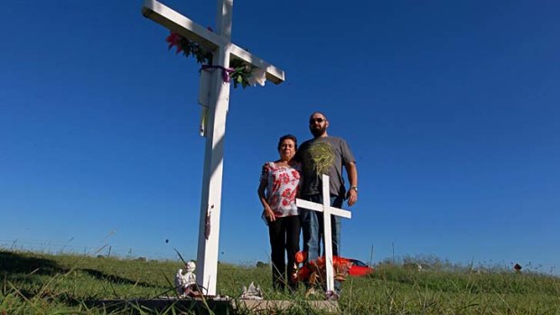 Waiting: Michelle's mother Loraine Bright with her son, Les, at the site where Michelle's body was found 15 years ago.