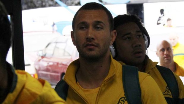 Carrying a weight ... Quade Cooper goes into Sunday's semi-final between the Wallabies and the All Blacks the centre of attention among supporters of both nations to see if he can defy the naysayers and bring his A-game when it matters most.