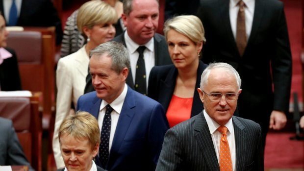 Prime Minister Malcolm Turnbull and Opposition Leader Bill Shorten arrive for the opening of the second session of the 44th Parliament, in the Senate.
