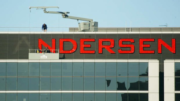 Andersen signs come down after the partnership broke up globally in the Enron scandal.