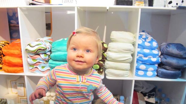 One-year-old baby Norah checks out the merchandise at the Baby and Toddler Expo in Brisbane yesterday.