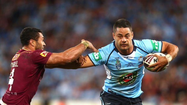 Blues brother: Jarryd Hayne gets rid of Justin O'Neill during Origin one.