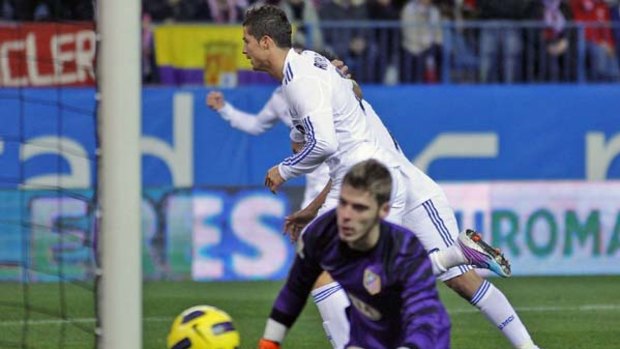 Goal . . . Cristiano Ronaldo reacts after scoring against Atletico Madrid.