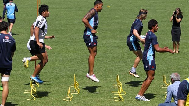 Hop to it: Waratahs train at Stanmore's Newington College on Thursday.