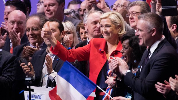 Marine Le Pen, France's presidential candidate and leader of the French National Front, gives a thumbs up during an election campaign meeting in Lille, France in March. 