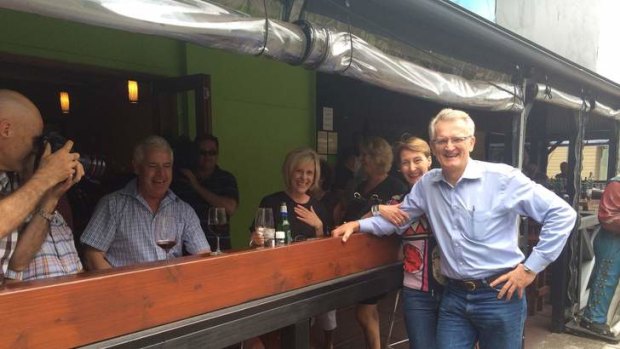 Bill Glasson takes time to chat with locals who cheered him on during his press conference.