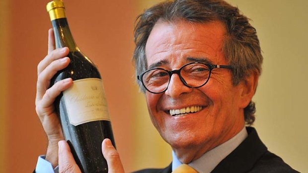 French private collector Christian Vanneque holds the world's most valuable bottle of white wine.