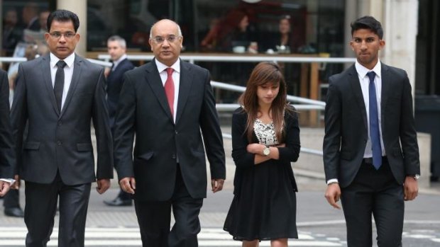 Benedict Barboza (left), husband of Jacintha Saldanha arrives at The  Royal Courts of Justice with his son Junal (right) and daughter Lisha and Member of Parliament Keith Vaz.
