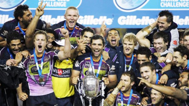 Melbourne Storm players celebrate their 2010 World Club Challenge victory.