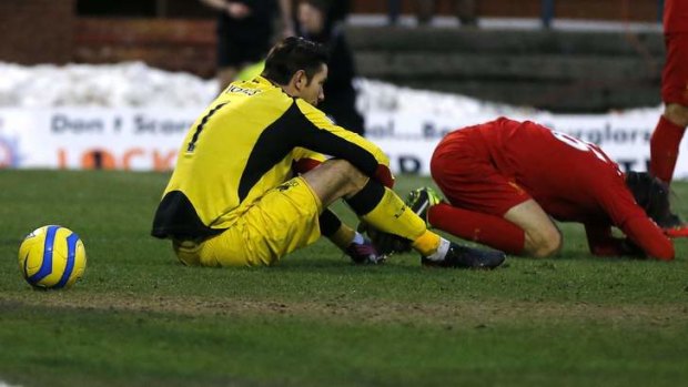 Shock exit ... Liverpool's Brad Jones and Sebastian Coates react after conceding their second goal.