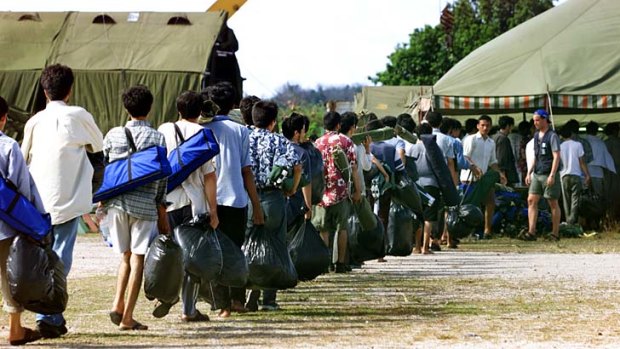 Asylum seekers arrive at Nauru: The offshore processing centre has been fraught with problems since its opening.