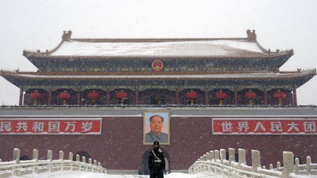 Storms have left the Tiananmen Gate and Beijing covered in snow.